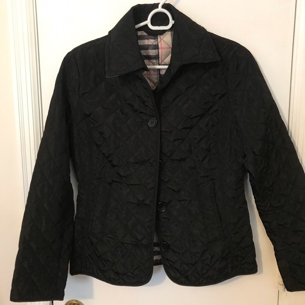 Lightweight black button jacket with plaid.